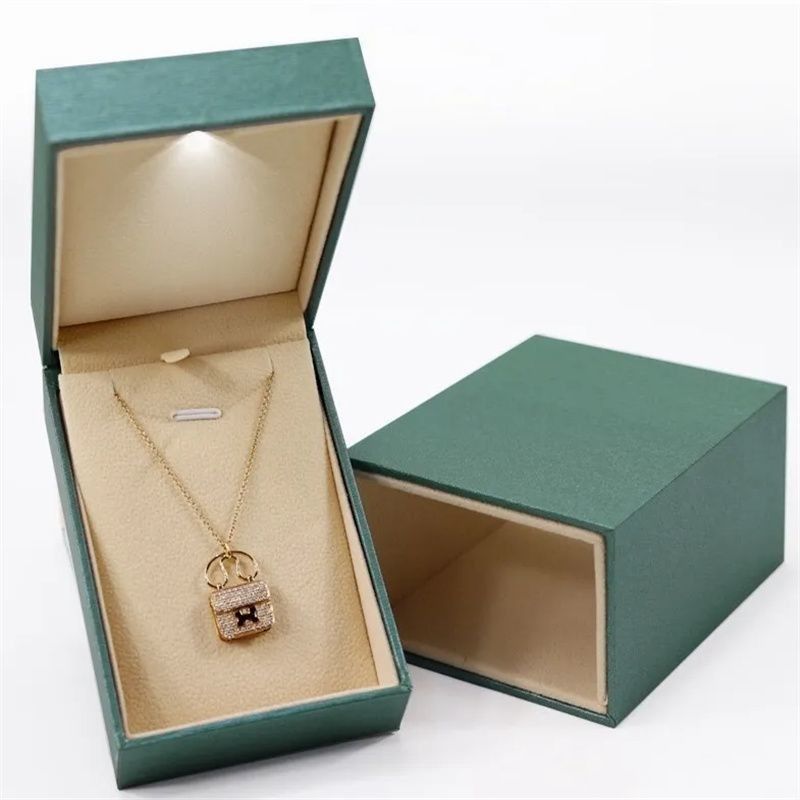 Caja de anillo/collar/auricular Tiempo de entrega a granel 15-20 días Envasado de papel 100% reciclable Caja de cajón con luz LED