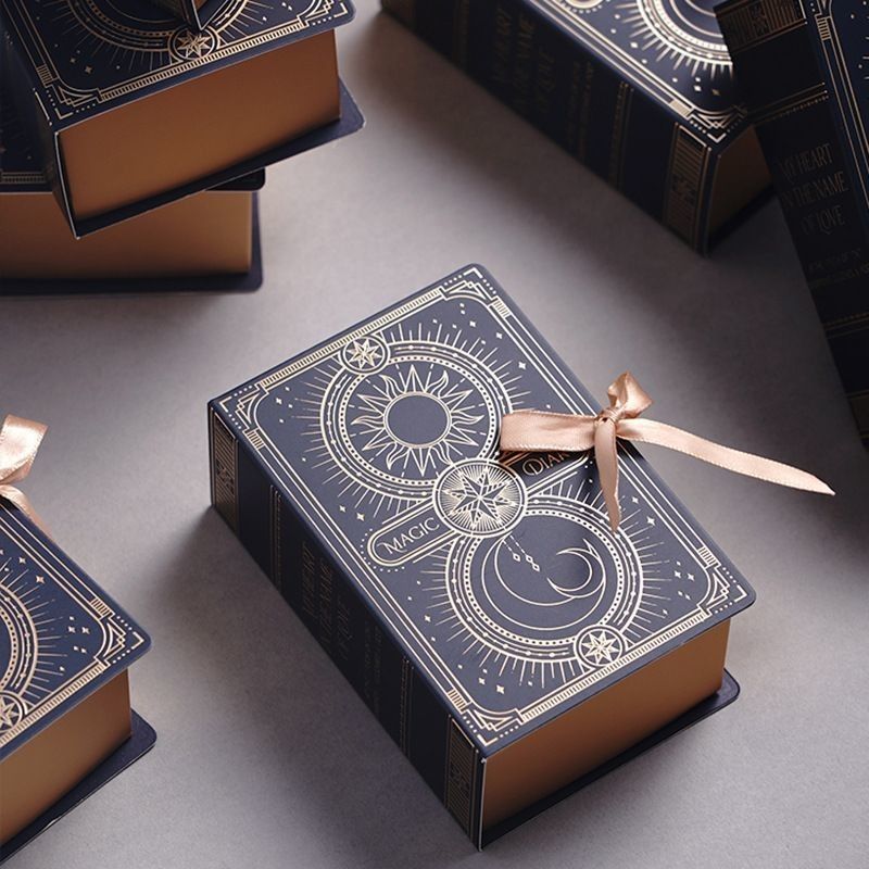 Tipo de libro embalaje de papel magnético de color azul caja de regalo con cinta de logotipo personalizado impreso