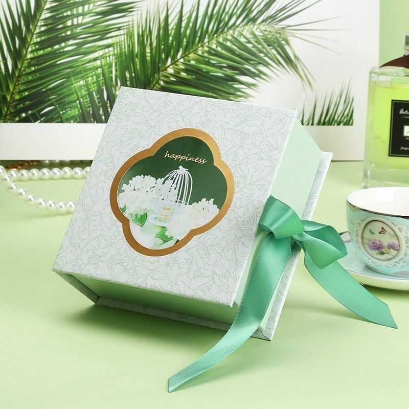 Tipo de libro embalaje de papel magnético de color azul caja de regalo con cinta de logotipo personalizado impreso