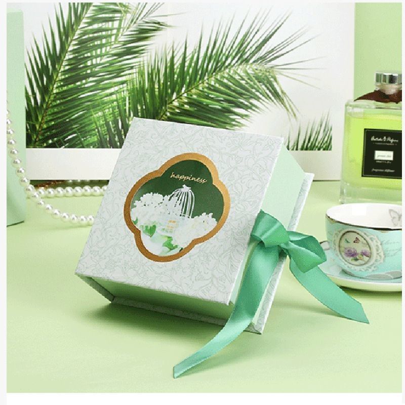 Tipo de libro embalaje de papel magnético de color azul caja de regalo con cinta de logotipo personalizado impreso