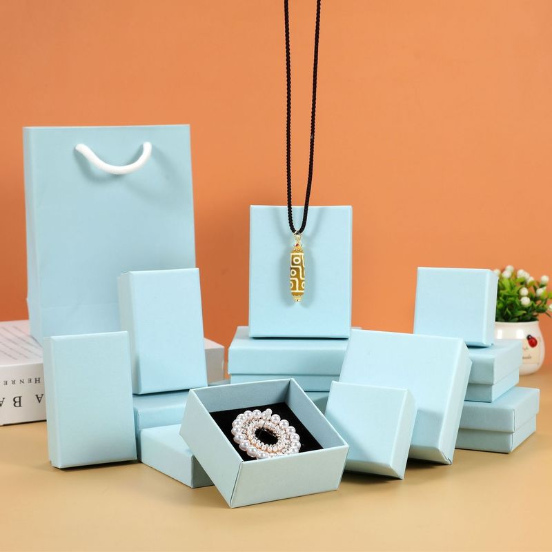 Capa rígida y base de la caja de cartón de papel de regalo de la caja de offset de impresión de la superficie de manejo de logotipo personalizado de impresión de embalaje