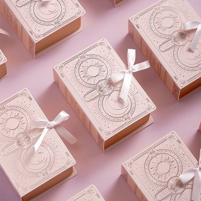 Tipo de libro embalaje de papel magnético de color azul caja de regalo con cinta de logotipo personalizado impreso